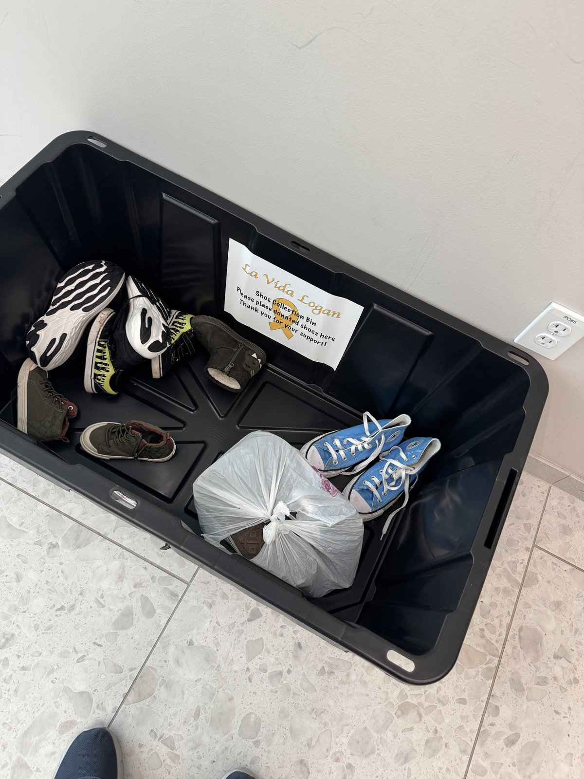 Donated shoes collected for the La Vida Logan Shoe Drive
